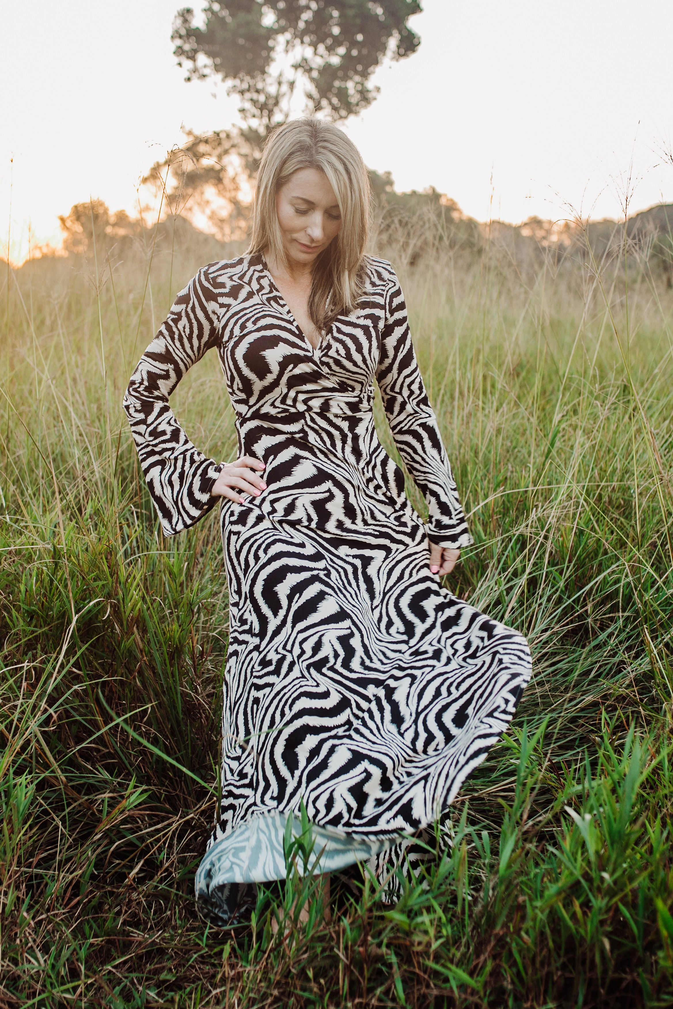 lexi boho maxi dress Sun drenched and effortlessly boho The LOLA MAXI DRESS in Clay from our Dunia Safari Collection captures the essence of free-spirited summer days. Styled with the Lexi Womens Belt or